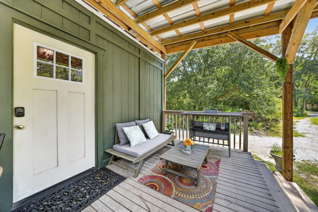 Covered deck lounge — shaded seating rain or shine