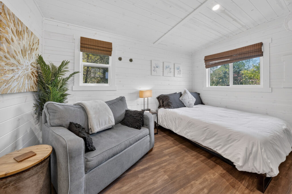 One open room: queen bed and a love seat that pulls out to a single