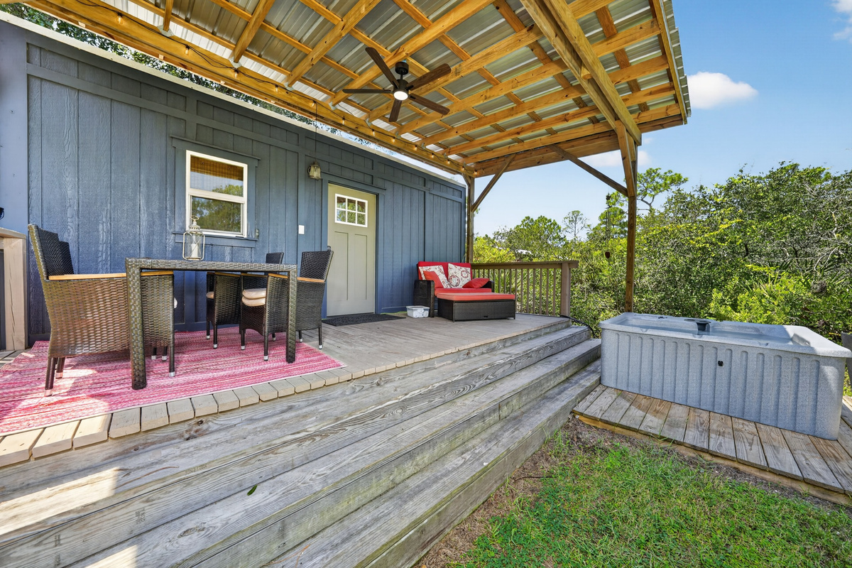 Outdoor dining under cover — usable straight through an afternoon shower
