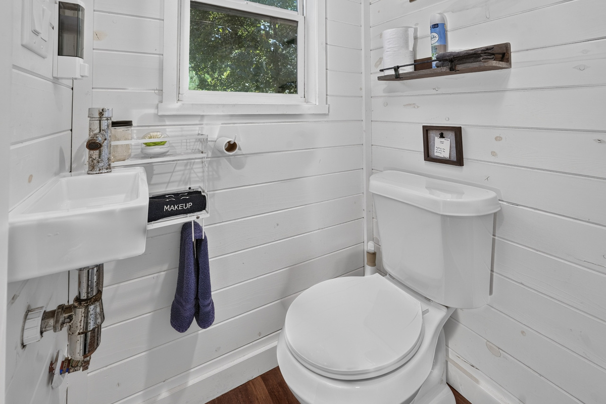 Vanity with hair dryer, starter soaps and paper goods provided